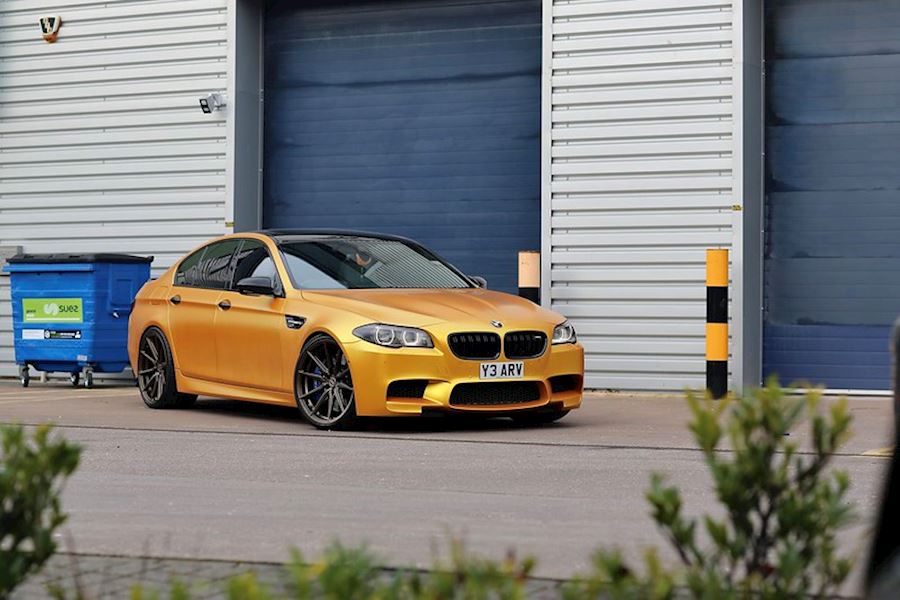 BMW F10 M5 installed with Vossen HF-3 wheels in Satin Bronze finish 