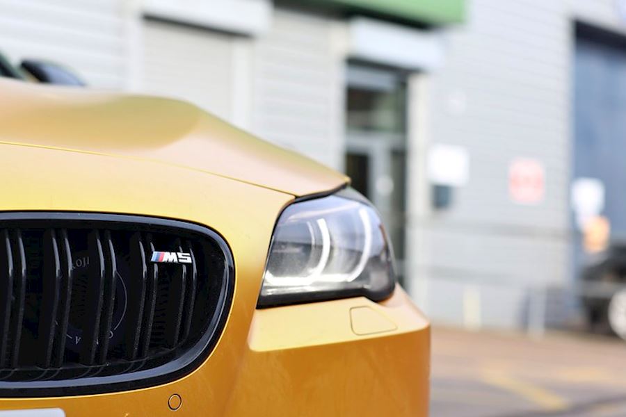 BMW F10 M5 installed with Vossen HF-3 wheels in Satin Bronze finish 