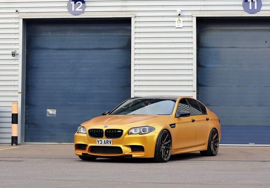 BMW F10 M5 installed with Vossen HF-3 wheels in Satin Bronze finish 