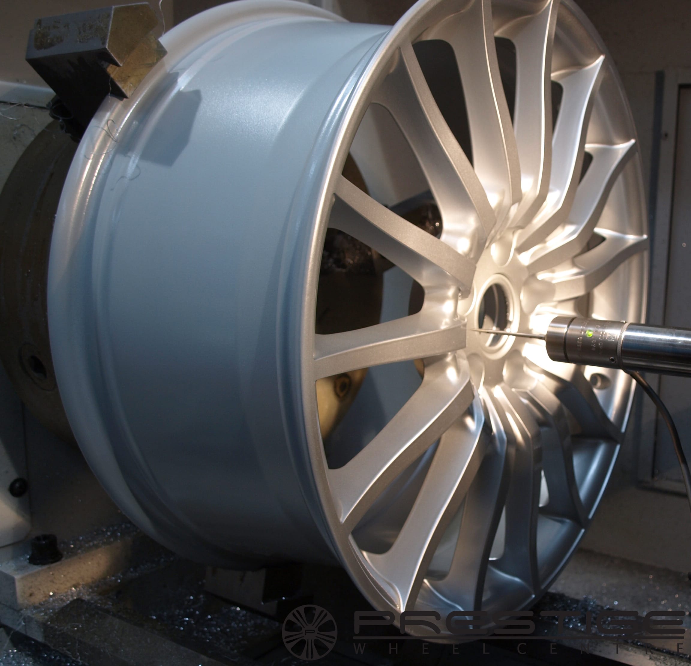 Aston Martin alloy wheel diamond cutting refurbishment at Prestige