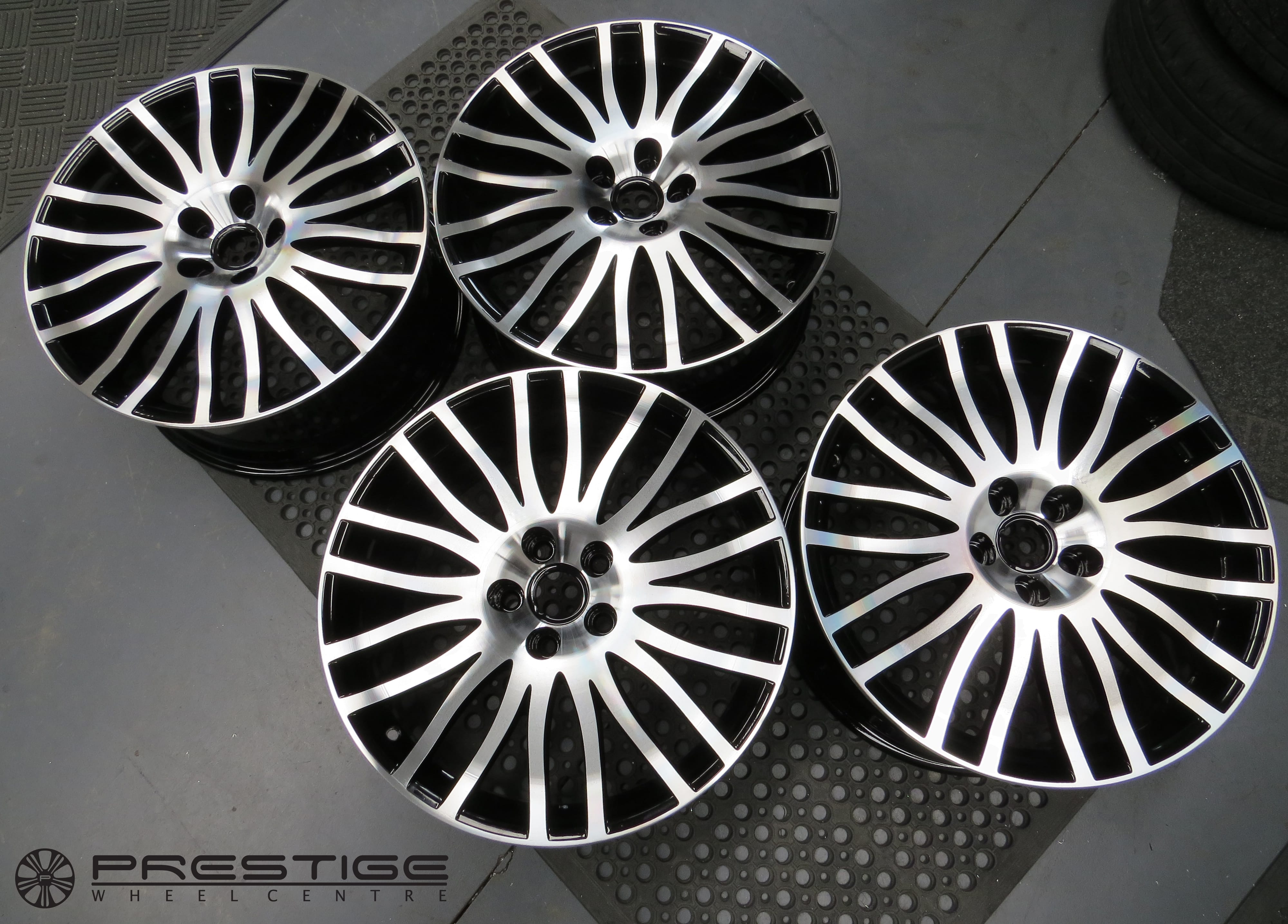 Aston Martin wheel refurbishment DB9 19″ 20 spoke diamond turned wheels